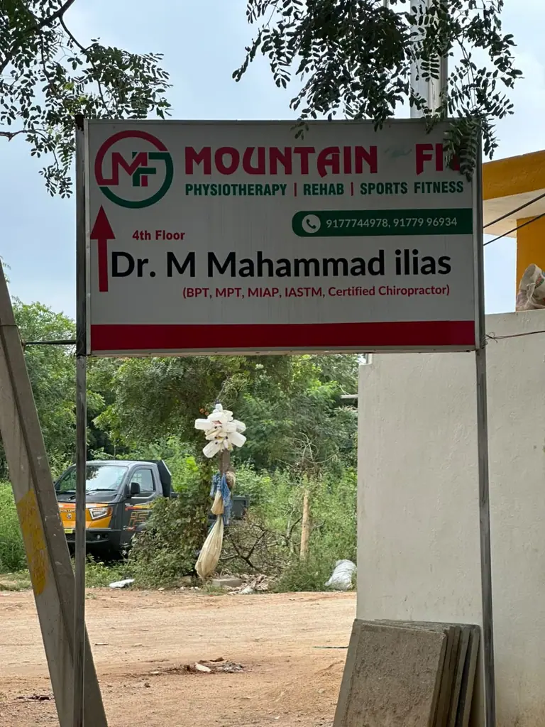 Mountain Fit signboard pointing to the 4th floor clinic of Dr. M Mahammad Ilias